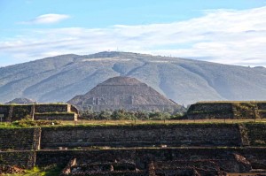 Teotihuacan is an enormous archaeological site in the Basin of Mexico, containing some of the largest pyramidal structures built in the pre-Columbian Americas. Apart from the pyramidal structures, the archaeological site of Teotihuacan is also known for its large residential complexes, the so-called "street of the dead", and its colorful well-preserved murals