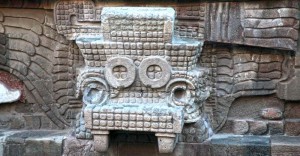 The giant serpent heads wear a feathered collar and decorate the pyramid side alternating with the serpent and then God Tlaloc – the God of Rains. When you look at the stone carvings remember that they were painted bright colors – likely deep reds and blues.
