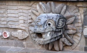 The giant serpent heads wear a feathered collar and decorate the pyramid side alternating with the serpent and then God Tlaloc – the God of Rains. When you look at the stone carvings remember that they were painted bright colors – likely deep reds and blues.