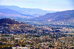 The Zapotec site of Atzompa is on a hilltop overlooking the present day city Oaxaca de Juárez on an adjacent hill to the