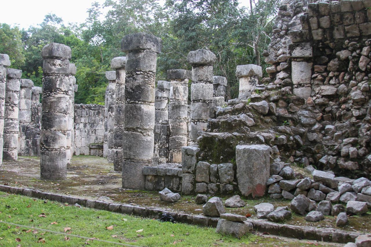 Rows of stone columns create layers of depth among the surviving walls.